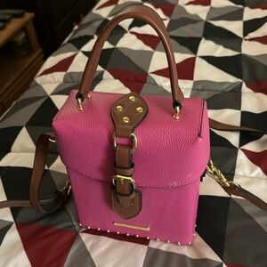 Pink purse with brown strap inside and out of purse shown in pictures